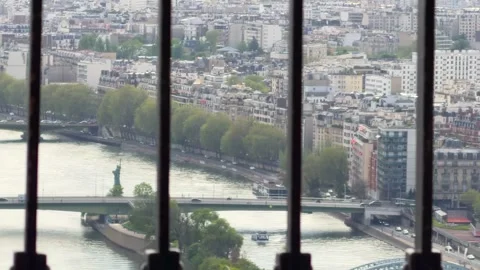 Paris city skyline from Eiffel Tower viewing Statue of Liberty, France Stock Footage 334134005