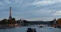 Paris City Skyline Ferry Boats on Seine River Tourist Water Transportation Dusk 4k or 4k+ Resolution