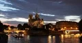 Paris City Skyline Tour Boat on Seine River and Famous Notre Dame Cathedral Dusk 4k or 4k+ Resolution