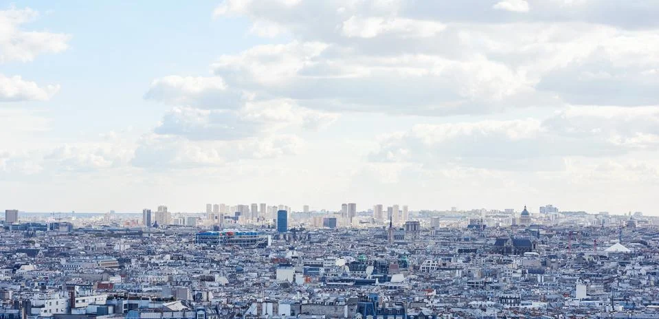 Paris cityscape in a cloudy day with Eiffel Tower Stock Photos