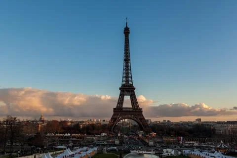 Paris cityscape with Eiffel tower at sunset, France Stock Photos