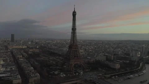 Paris Cityscape Featuring a Towering Iron Lattice Monument at Sunset Stock Footage 330992972