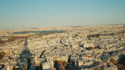 Paris cityscape with the long shadow of the Eiffel tower. Paris 스톡 동영상 313417295