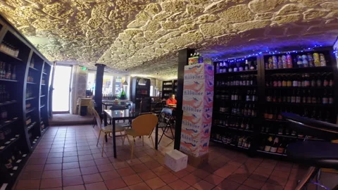 Paris Craft Beer Bar Bottle Shop and Seating Area Interior Panning Shot Stock Footage 345875149