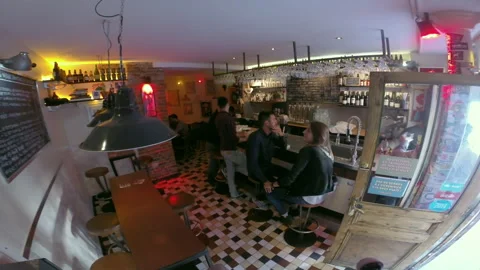 Paris Craft Beer Bar High Angle Shot of Patrons at Tables and Counter Stock Footage 346294166