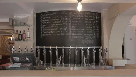 Paris Craft Beer Bar Menu Blackboard and Draft Taps Zoom In Stock Footage 346394550
