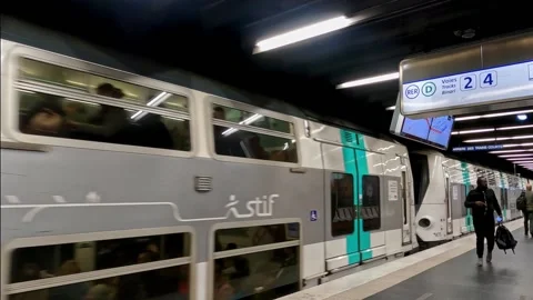 Paris Double Deck RER Metro Train Leaving Station Stock Footage 222555862