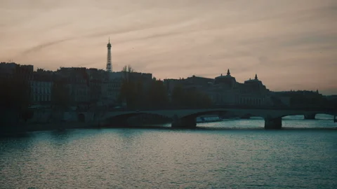 Paris during a sunset with the eiffel tower in the background Stock Footage 139757374