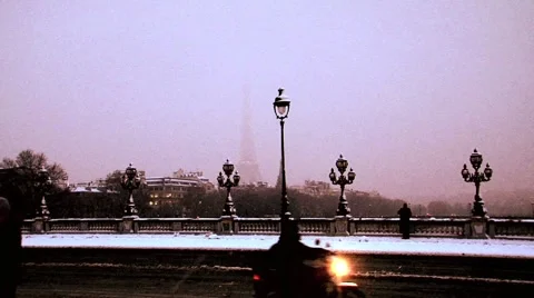 Paris eiffel tower alexandre III bridge covered in snow Stock Footage 979156
