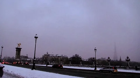 Paris eiffel tower and alexandre III bridge covered in snow Stock Footage 977012