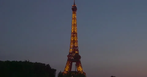 Paris Eiffel Tower illumination at dusk - Tour Eiffel in France at evening in 8k Stock Footage 210738012