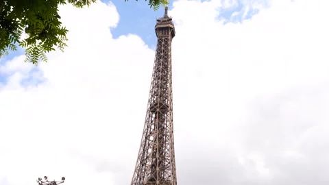 Paris, the Eiffel Tower in late spring, with beautiful building Stock Footage 260696314