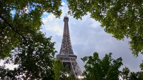 Paris Eiffel Tower looking up through trees Stock Footage 227931233