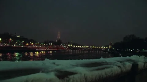 Paris eiffel tower by night covered in snow Stock Footage 979470
