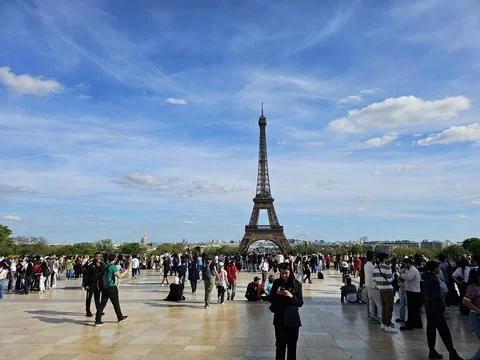 Paris Eiffel Tower, in spring with beautiful sky in the background Stock Photos