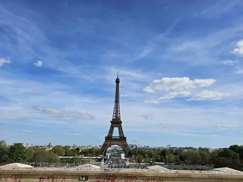 Paris Eiffel Tower, in spring with beautiful sky in the background Stock Photos
