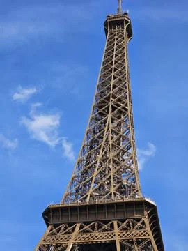 Paris Eiffel Tower, in spring with beautiful sky in the background Stock Photos