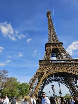Paris Eiffel Tower, in spring with beautiful sky in the background Stock Photos