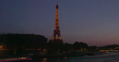 Paris Eiffel Tower at sunset - Illuminated Tour Eiffel in France at evening 8k Video stock 210567750