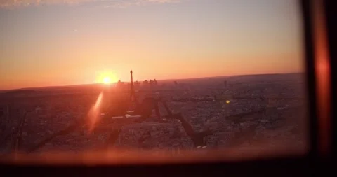 Paris Eiffel Tower at Sunset Pan Reveal from Panoramic Rooftop View of City Stock Footage 244102926