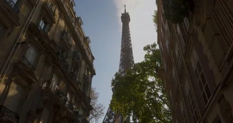 Paris Eiffel Tower - Tour Eiffel in France between houses in 8k Stock Footage 210461498