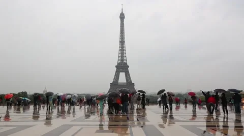 Paris, Eiffel Tower view from Trocadero with people, rain Stock Footage 42866012