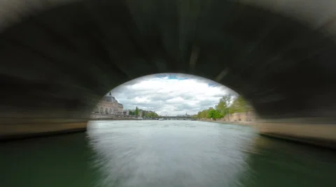 Paris. The excursion motor ship floats down the river Seine in the cloudy spring Stock Footage 48771333