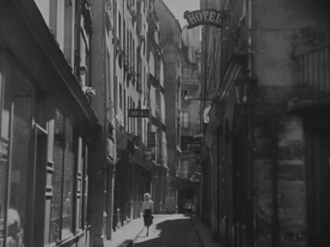 Paris, France - 1930s: Woman walks throu... | Stock Video | Pond5