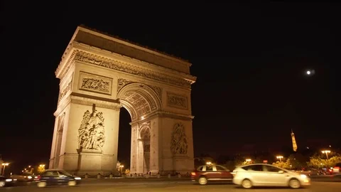 PARIS, FRANCE- CIRCA August 2017: Illuminated at night Arch of Triumph in Paris Stock Footage