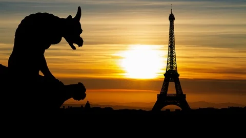 Paris: Gargoyle looks Eiffel Tower and City Skyline at Sunset, France Stock Footage 102644384