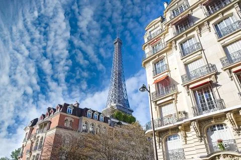 Paris, Haussmann facade and the Eiffel Tower 
 Stock Photos