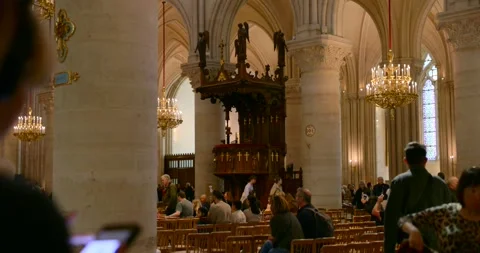 Paris — interior cathedral video with soaring Gothic arches, chandeliers and Stock Footage 321945409