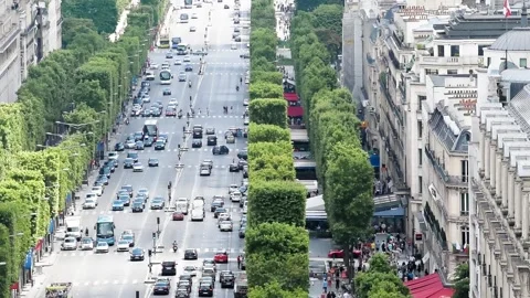 PARIS - JULY 2014: Famous Champs Elysees aerial view from Arc de Triomphe. Slow Stock Footage