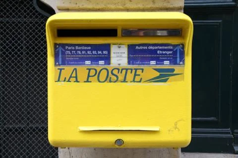 PARIS - JULY 24: La Poste postbox on July 24, 2011 in Paris, France. La Poste Stock Photos