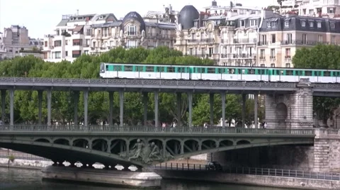 Paris metro crossing over the seine river Stock Footage