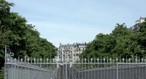 Paris - Metro in the middle of Paris with trees and buildings Video stock 68535374