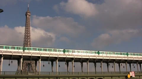 Paris metro passing in front of the eiffel tower Stock Footage 8506344