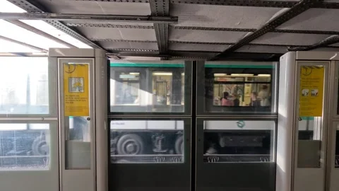 Paris Metro Train Arrival and Departure Stock Footage 303944112