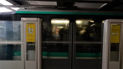 Paris Metro Train Arrival and Departure Stock Footage 303956661