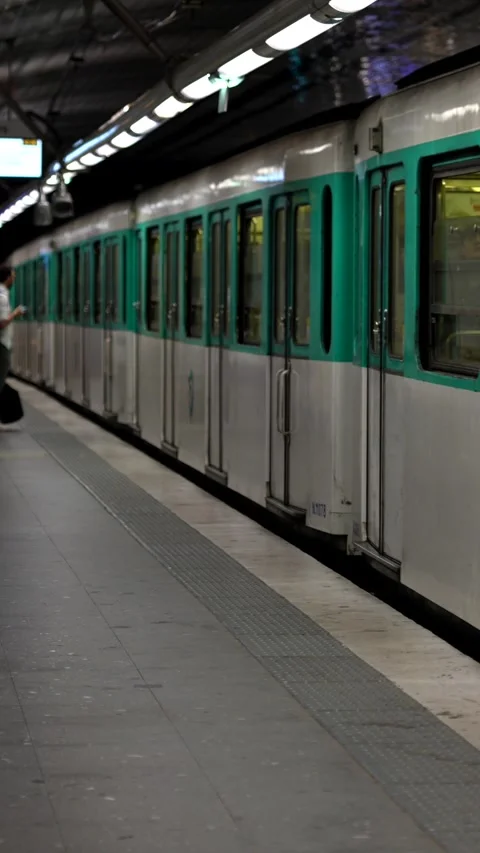 Paris Metro train at station platform Paris France July 18 2025 Stock Footage 314980127