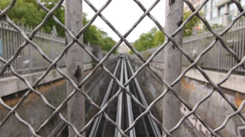 Paris metro train through fence. Stock Footage 24336587