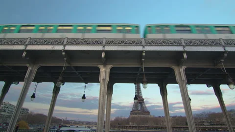 Paris metro underground subway system train passing on bridge Bir Hakeim Stock Footage 235311011