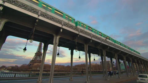 Paris metro underground subway system train passing on bridge Bir Hakeim Stock Footage 235311204