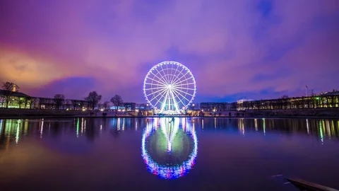 Paris night ferris wheel tuileries garden pond panorama 4k time lapse france Stock Footage 74682553