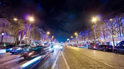 Champs elysees at night time hi-res stock photography and images