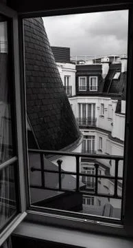 Paris open Window view rainy gables Stock Photos