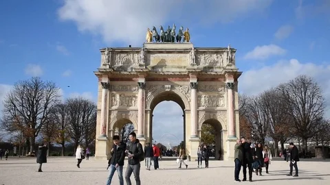 Paris: People walking in front of the Arc de Triomphe du Carrousel, France Stock Footage 83079545