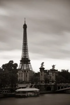 Paris River Seine with Eiffel tower and Alexandre III bridge at sunset Stock Photos