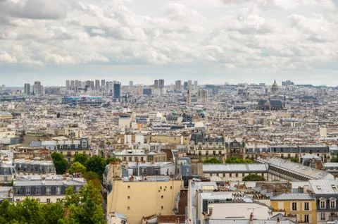 Paris roofs with a cloudy sky Stockfoto's