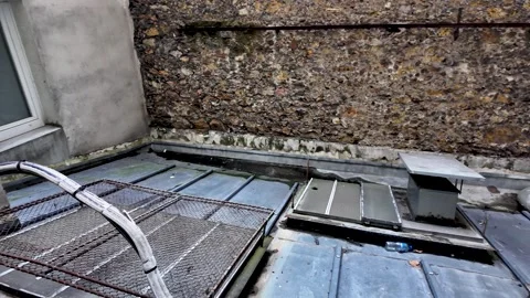 Paris rooftop with stone wall and zinc roof Stock Footage 330860373